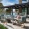 Ample seating on outdoor patio with access to community fire pit at Lake House