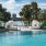 Spacious zero edge pool with beauitful views of Lake Ivanhoe from pool deck