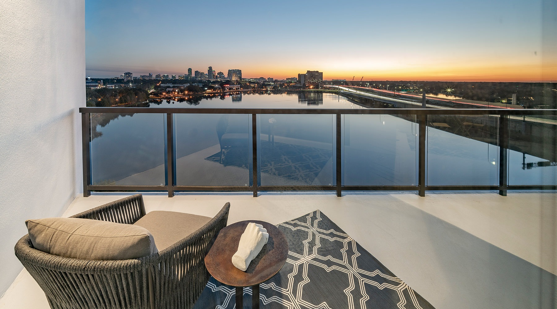 Spacious patio overlooking a lake 